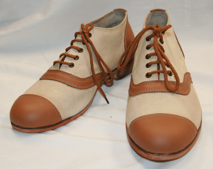 Canvas and leather Oxford Tie shoe.