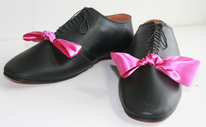 A Magenta bow,  a new color at the time, named after the famous 1850's battle.