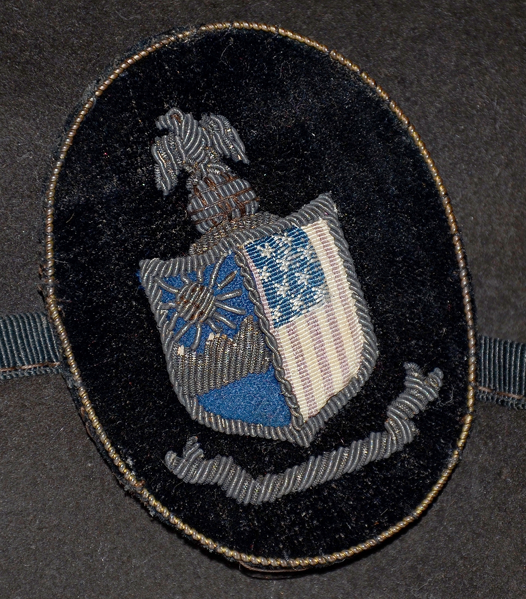 Close up of original NY State Seal Insignia.